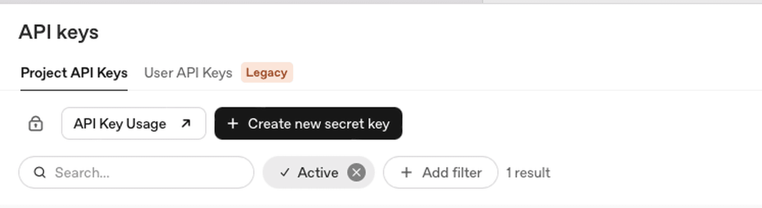La page « API keys » d’OpenAI. Le bouton noir « Create new secret key » est en haut à gauche.