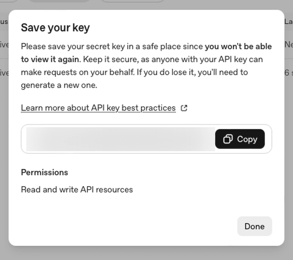 La fenêtre « Save your key ». La clé est floutée ici ; sur ton écran elle est lisible, et le bouton « Copy » la met dans ton presse-papier.